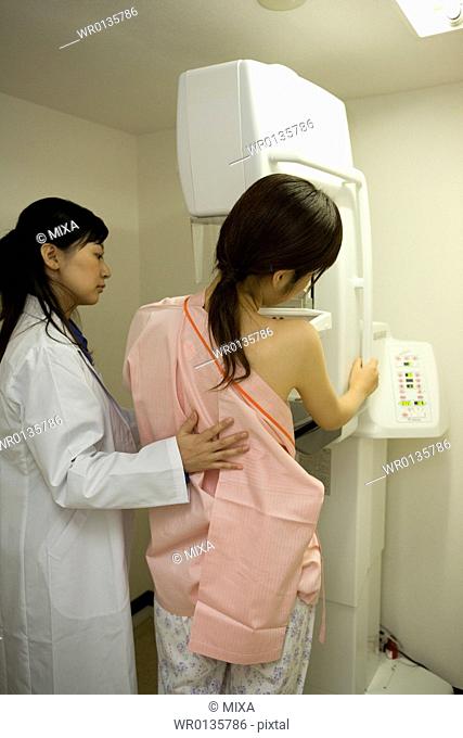 Young woman having mammogram