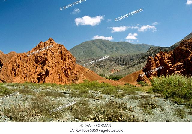 The Mountain of Seven Colours behind the village of Purmamarca is one of the major attractions of the region, formed in the Cretaceous period
