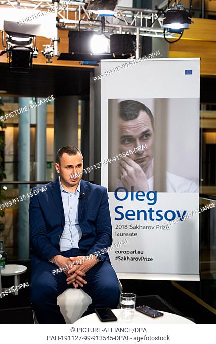 26 November 2019, France (France), Straßburg: Ukrainian film director and former political prisoner Oleg Senzow speaks to him during an interview in the...