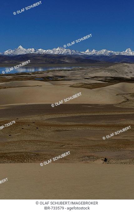 View of the snow-covered Himalayas and the Tsangpo or Brahmaputra River, dune landscape near Satsang, Ngari Province, Tibet, China