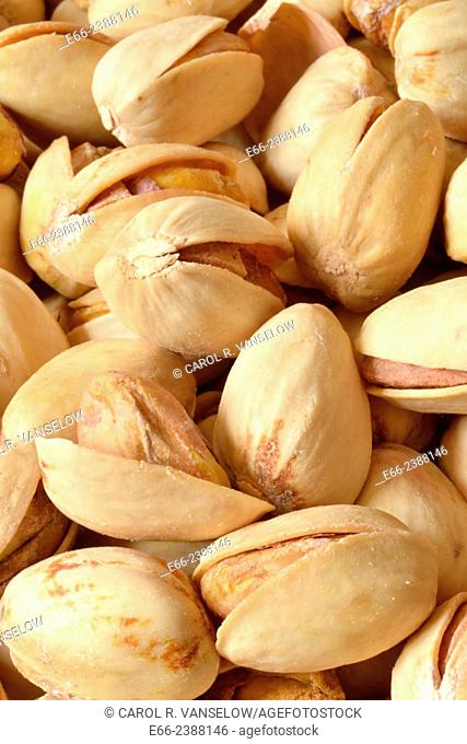 Healthy snacks: bowl of unsalted pistachio nuts. Close up