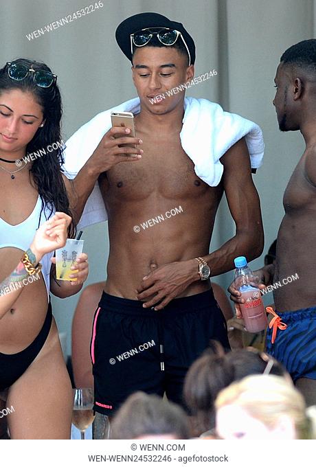 Manchester United footballer Jesse Lingard enjoys the end of the football season as he parties poolside in Miami. The striker is said to have jetted off to the...