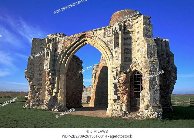 A view of the ruined gatehouse of St Benet's Abbey with shell of old mill on the Norfolk Broads near Horning, Norfolk, England, United Kingdom