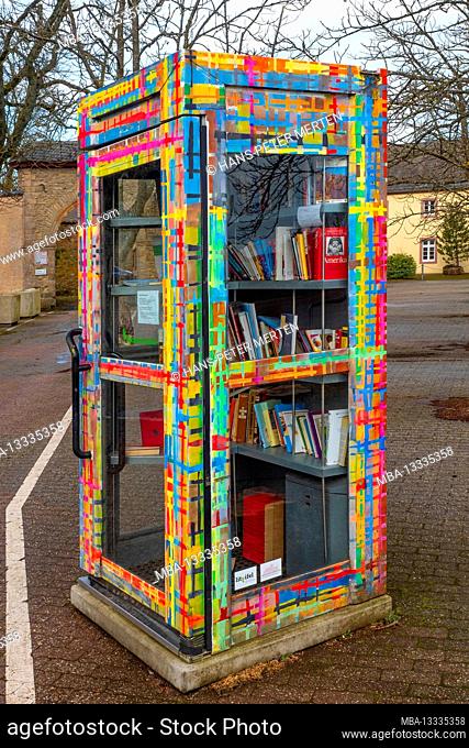Books telephone booth at Steinfeld Monastery near Kall, Eifel, North Rhine-Westphalia, NRW Germany