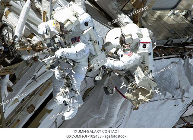 Expedition 35 Flight Engineers Chris Cassidy (right) and Tom Marshburn completed a space walk at 2:14 p.m. EDT May 11 to inspect and replace a pump controller...