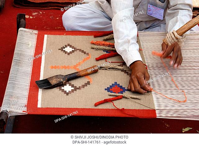Weaving of famous salawas carpet ; Jodhpur ; Rajasthan ; India