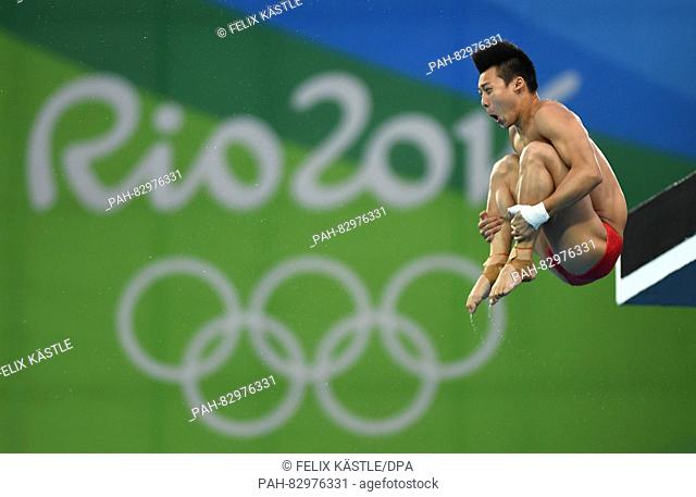 Gold medalist Chen Aisen of China in action during the Men's 10m Platform Final of the Diving event during the Rio 2016 Olympic Games at the Maria Lenk Aquatics...
