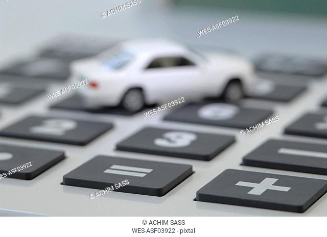 Toy car on calculator
