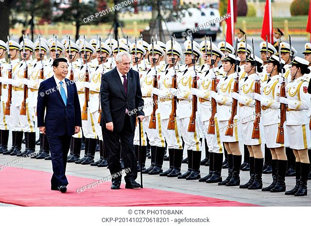 Czech Republic's President Milos Zeman, right, and Chinese President Xi Jinping review a guard of honor during a welcome ceremony outside the Great Hall of the...