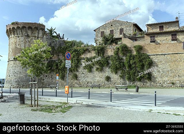 cityscape with donjon and medieval walls at historical hilltop village, shot at San Gimignano, Siena, Tuscany, Italy