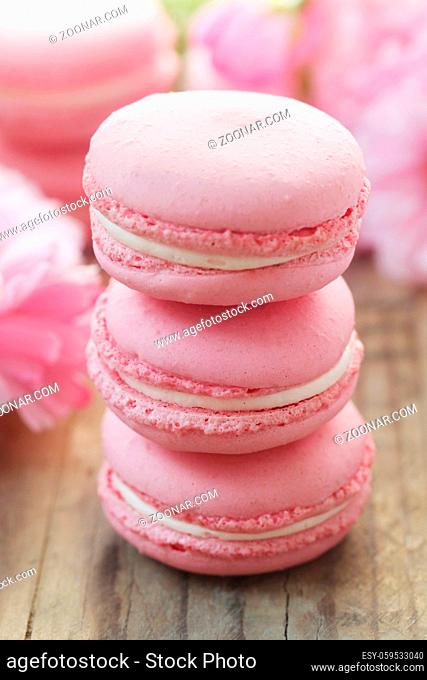 Pink Macarons On A Wooden Background