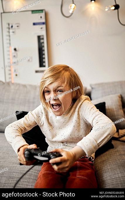 Girl playing video game