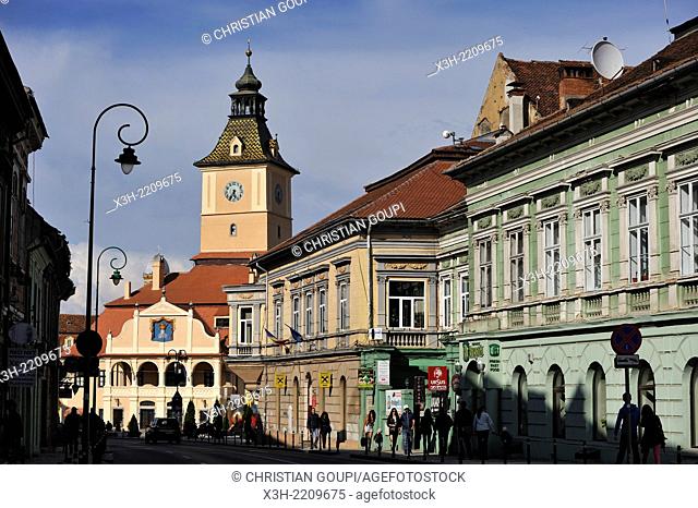 Muresenilor street with the clock tower of the Old Town Hall in the background, Brasov, Transylvania, Romania, Southeastern and Central Europe