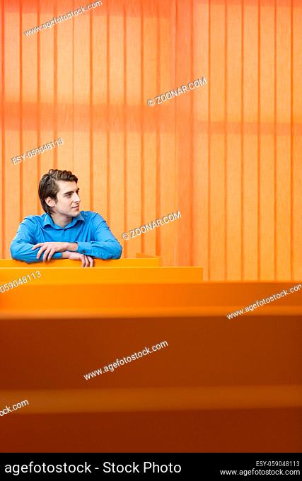 Young businessman working in modern office