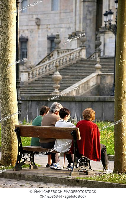 People sitting in the gardens of the Shrine of Loyola, Azpeitia, Gipuzkoa, Guipuzcoa, Basque Country, Spain