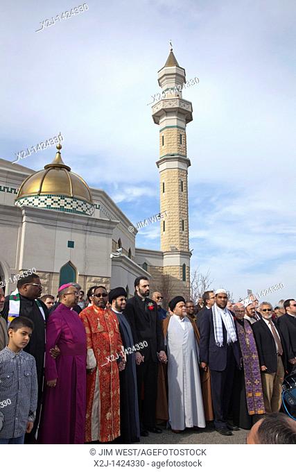 Dearborn, Michigan - Religious leaders from Muslim, Christian, and Jewish faiths led a prayer service and vigil at the Islamic Center of America in opposition...
