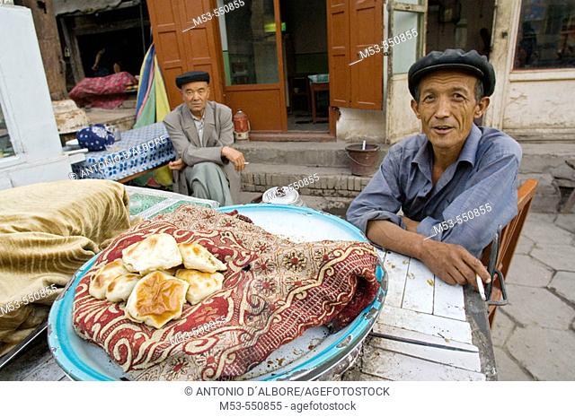 A uigur seller of bread. Kashgar. Xinjiang province. China. Asia