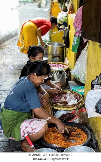 Women preparing food on the street, Yogyakarta, Java, Indonesia