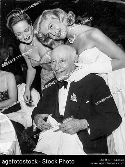 Dorothy Lamour and Lizabeth Scott join in congratulating Zukor at his 80th birthday party at the Waldorf-Astoria, New York, on March 4, 1953