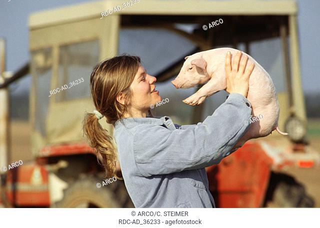 Woman with Domestic Pig piglet