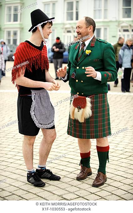 A man wearing traditional welsh kilt at Welsh Lady charity sponsored fun run, St Davids Day, Aberystwyth Wales UK
