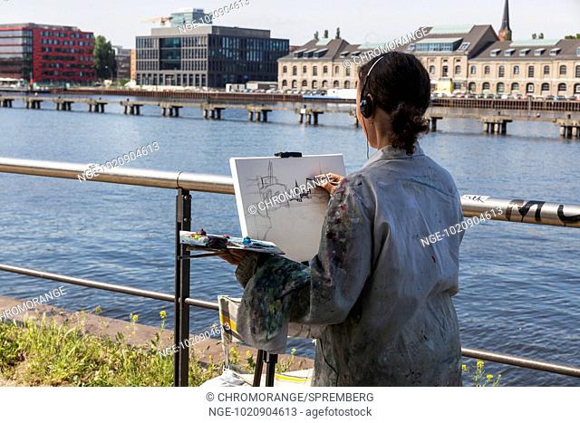 Painter on the River Spree in Berlin