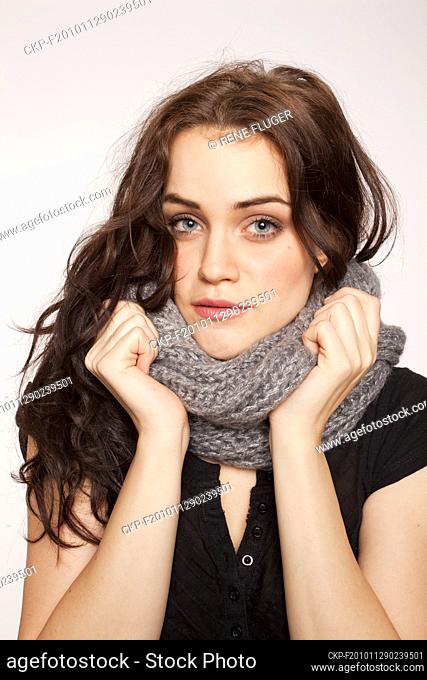 A beautiful young woman, lady, girl, cold, runny nose, headache, scarf  (CTK Photo/Rene Fluger) MODEL RELEASED, MR