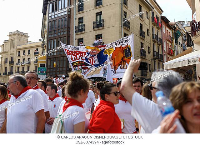 PAMPLONA, SPAIN - JULY 10, 2017: Banner of the group of friends Irrintzi, with a cartoon of donald trump. Political satire of the most important events of the...