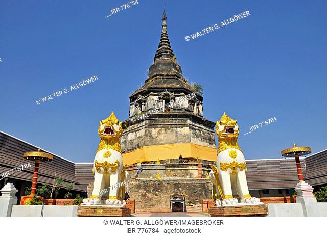 Gilt statues in front of an old stupa, Wat Yaang Kuong Temple, Chiang Mai, Thailand, Southeast Asia