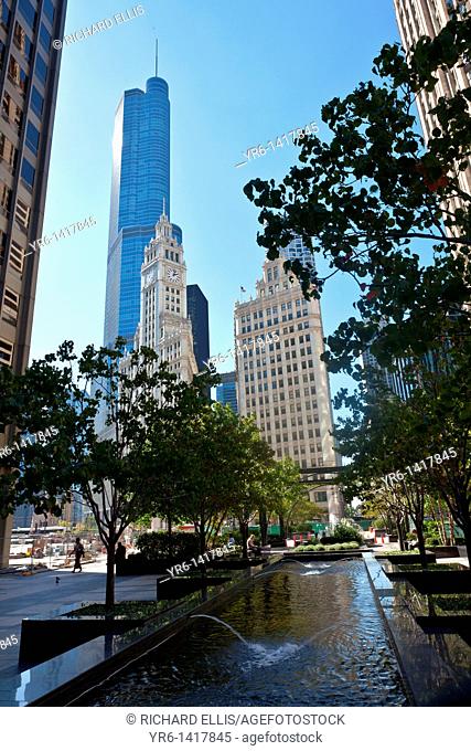 View of Trump Tower and the Wrigley Building from Pioneer Court in Chicago, IL, USA