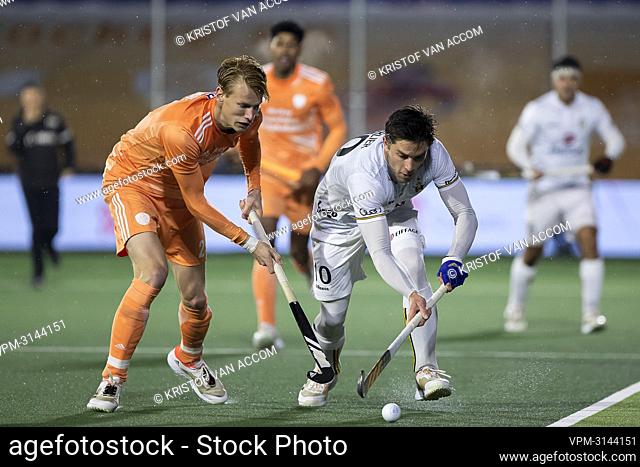 Dutch Joep de Mol and Belgium's Cedric Charlier pictured in action during a hockey game between the Dutch national team and the Belgian Red Lions