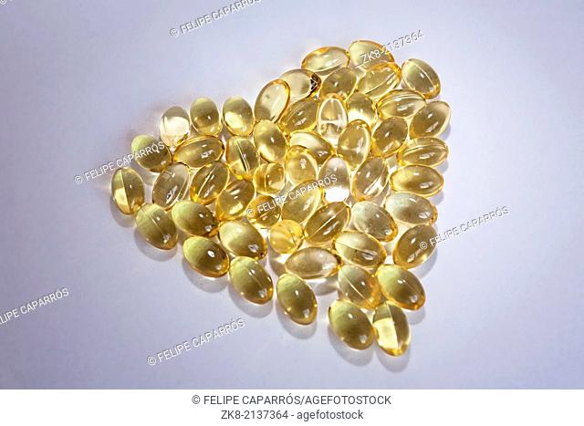 Cod liver oil Omega 3 gel capsules in the form of heart isolated on white background