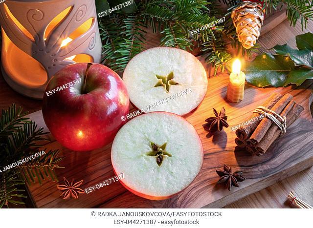 Christmas decoration with apples cut in two halves with a star in the middle