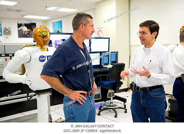 NASA astronaut Dan Burbank (left), Expedition 29 flight engineer and Expedition 30 commander, participates in a Robonaut familiarization training session in the...