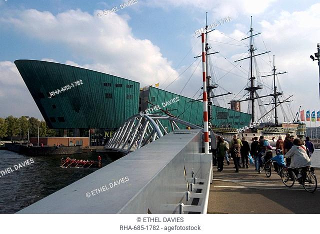 NEMO, the new science and technology museum and the VOC ship from the Maritime Museum, Eastern Docks, Amsterdam, Netherlands, Europe