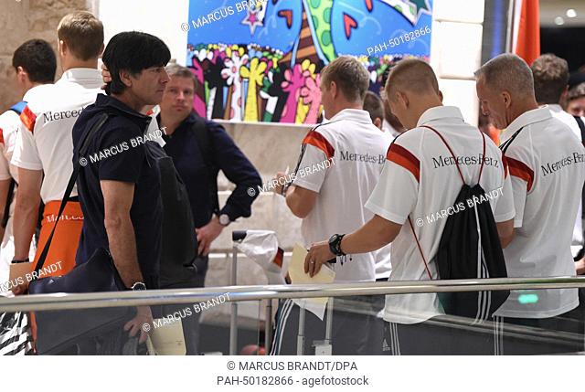 The head coach Joachim Loew (L) and the German national soccer team arrive at the Sheraton Rio Hotel & Resort in Rio de Janeiro, Brazil, 11 July 2014