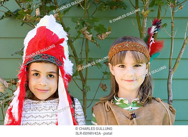 Two girls in Native American costumes