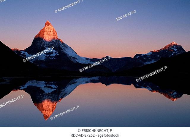 Matterhorn 4478 m mirrored in lake Riffel at dawn Valais Switzerland