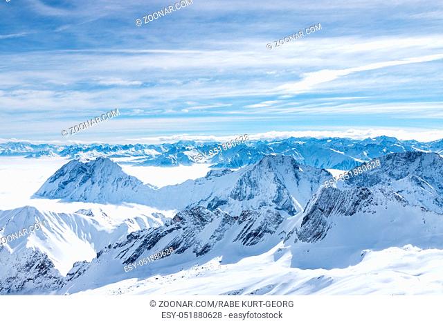 A view from the Zugspitze, the top of Germany, over the European Alps on a sunny day