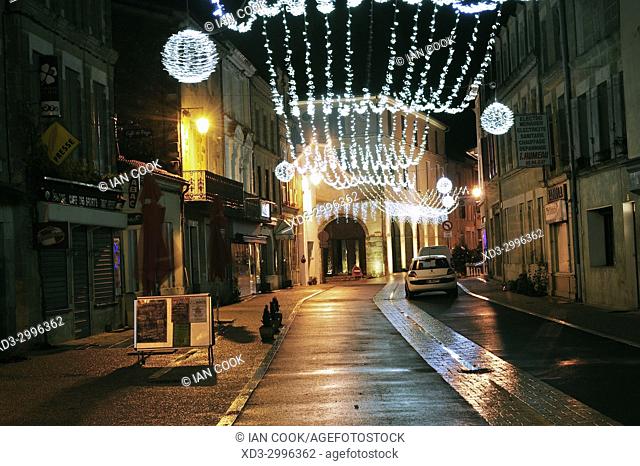 village of Lauzun at night with Christmas lights, Lot-et-Garonne Department, New Aquitaine, France