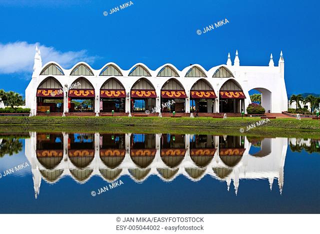 Asian style building reflecting in the water, Eagle Square, Kuah Town, Malaysia