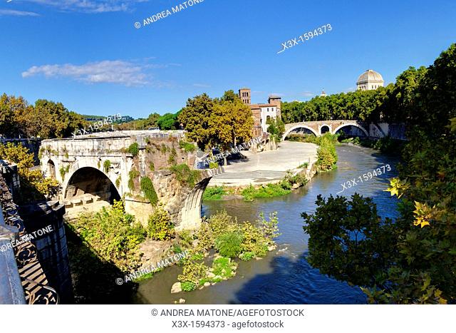 Ancient Pons Aemilius bridge and the Tiber Island Rome Italy