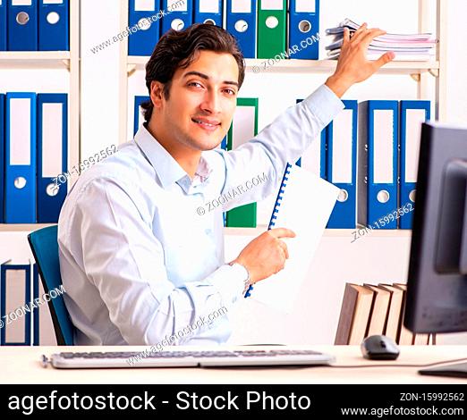 The young handsome businessman working in office