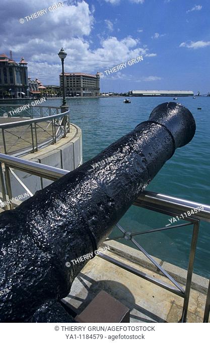 Old canon displayed on Caudon waterfront, Port Louis harbor. Mauritius Island. Indian Ocean