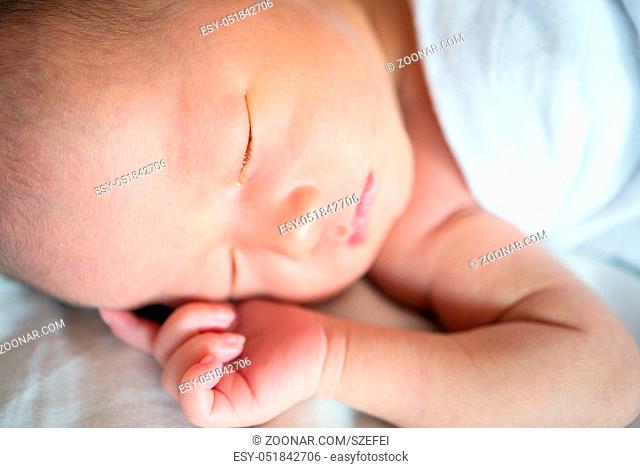 Close up Little Asian newborn baby boy 7 days, sleeps