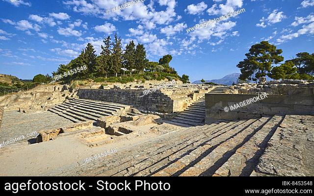 Super wide angle, open stairs, morning light, blue sky, white clouds, trees, Minoan palace of Festos, Messara plain, central Crete, island of Crete, Greece