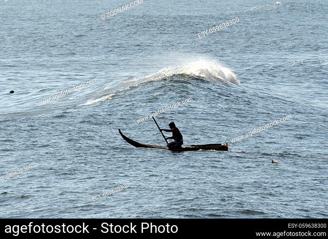 Pimentel, Peru - March 16, 2015: The fisherman goes to sea on a Traditional Peruvian small Reed Boats (Caballitos de Totora)