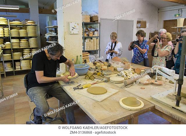 At the Atelier Soleil, which is among the oldest and most authentic ceramic workshops in Provence, the owner demonstrates the making of the faience earthenware