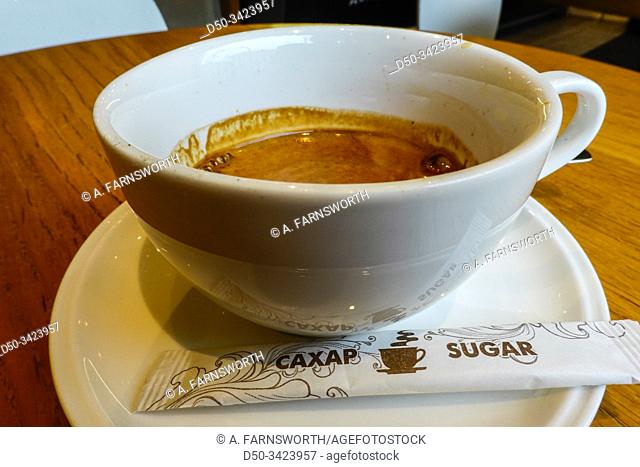 St Petersburg, Russia A cup of espresso coffee and a pack of sugar