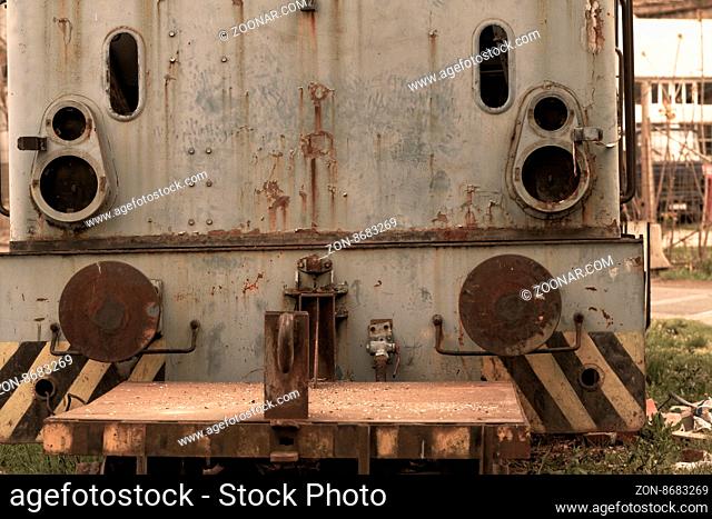 Photo of an old and rusty locomotive